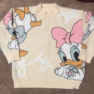 Disney Women's Cream and Pink Daisy Duck Sweater